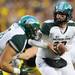 Michigan State quarterback Andrew Maxwell looks to hand off the ball during the fourth quarter against Michigan State at Michigan Stadium on Saturday afternoon. Melanie Maxwell I AnnArbor.com